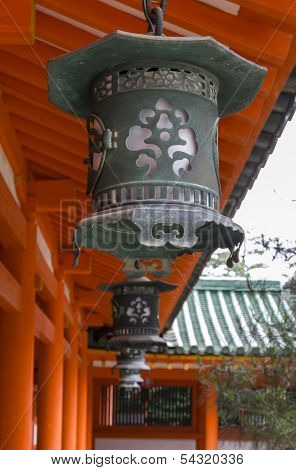 A Row Of Decorative Metal Lanterns At Heian Jingu Shrine In Kyoto, Japan