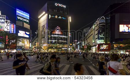 Crowds Of People At Shibuya Crossing In Tokyo, Japan.