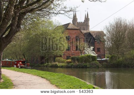 River Scene With Narrow Boat & House