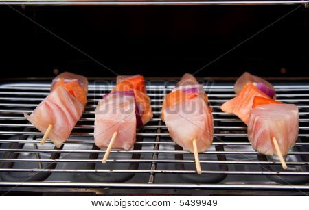 Fish Spear Grilling On Barbecue