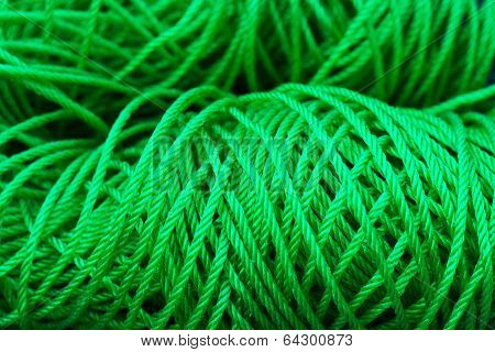 bundle of green plastic rope