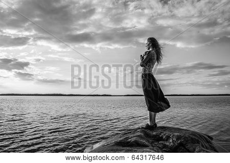 Woman Looks At The Horizon
