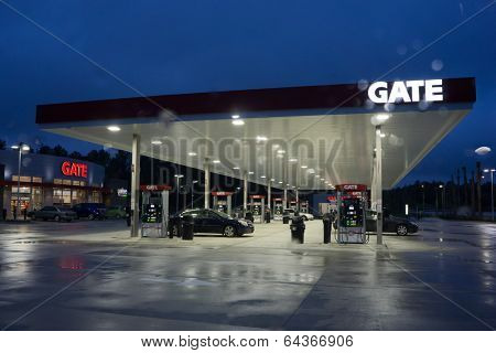 JACKSONVILLE, FL - MAY 2, 2014: A Gate Petroleum gas station on a rainy morning. Gate Petroleum is headquartered in Jacksonville and has over 225 gas stations in six states with over 2,200 employees.