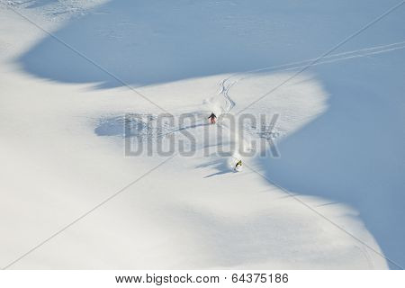 jumping skier at mountain winter snow fresh suny day