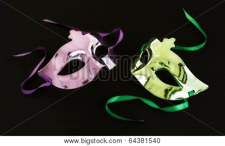 Purple And Green Carnival Mask On Dark Background