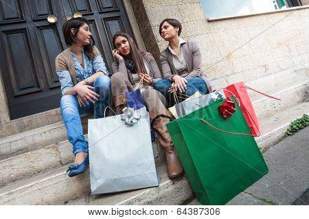 Happy Girls Messaging With Mobile Phone After Shopping