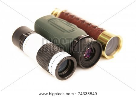 Modern monocular telescopes isolated on white