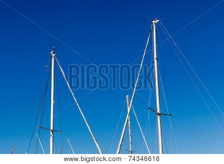 Detail Shot Of Sailing Boat Poles (mainmasts) In Marina.
