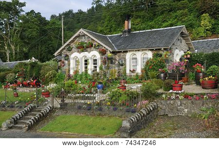 Stone Cottage With Flower Garden