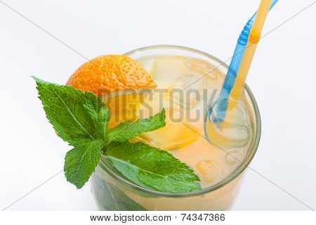 Glass Of Fresh Lemonade With Orange, Ice Cubes, Mint, Straws