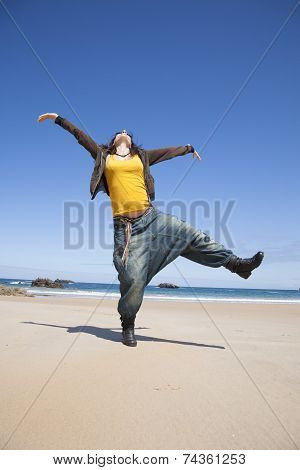 Dancing Pregnant Woman At Beach