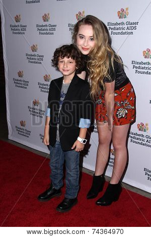 LOS ANGELES - OCT 19:  Sabrina Carpenter, August Maturo at the 25th Annual 