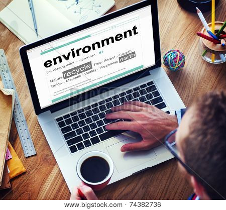 Man Reading the Definition of Environment