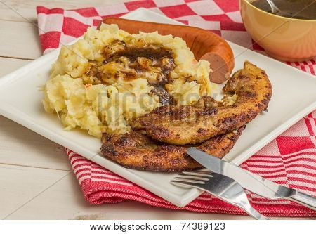 Typical Dutch Dish Zuurkool With Pork Belly And Smoked Sausage