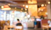 Coffee Shop Blur Background With Bokeh Image.