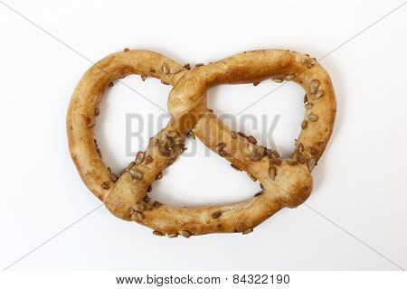 Bavarian Pretzel With Sunflowers Seeds Isolated On White Baskground