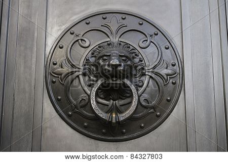 Black Metal Shield With A Lion's Head Carved