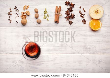 Mulled Wine, Punch And Spices For Glintwine On Wooden Background