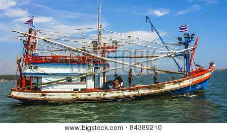fishermen at the boat