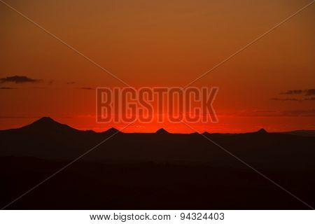 Sunset silhouette over the mountain