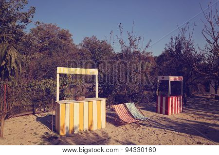 Lemonade Stand And Kissing Booth In The Garden