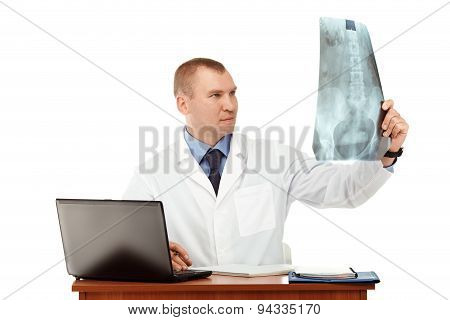 Portrait Of A Young Male Doctor In A White Coat