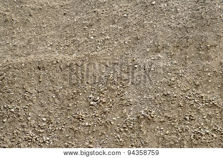 Close up of unsifted natural dirt with small stones