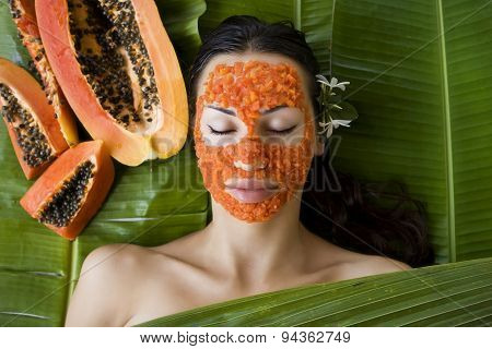 Beautiful Woman Having Fresh Papaya Facial Mask Apply. Fresh Papaya