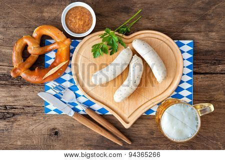 Bavarian meal with white sausage on cutting board