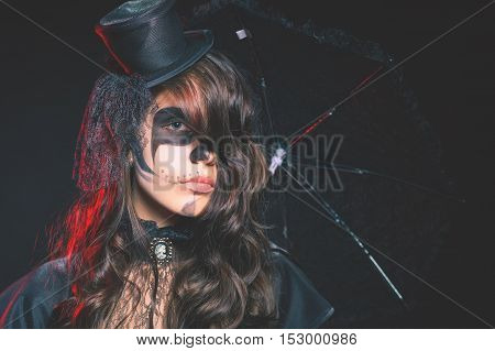 Fashion girls celebrating Halloween 2016. Haloween costumes. Masquerade party