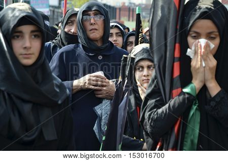 Istanbul Turkey - October 11 2016: Muslims worldwide marks Ashura Istanbul Shiite community. Turkish Shia Muslims mourning for Imam Hussain. Caferis take part in a mourning procession marking the day of Ashura in Istanbul's Kucukcekmece district Turkey on