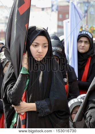 Istanbul Turkey - October 11 2016: Muslims worldwide marks Ashura Istanbul Shiite community. Turkish Shia Muslims mourning for Imam Hussain. Caferis take part in a mourning procession marking the day of Ashura in Istanbul's Kucukcekmece district Turkey on