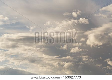 Cumulus clouds against a blue sky. Mostly Cloudy. Synoptics.