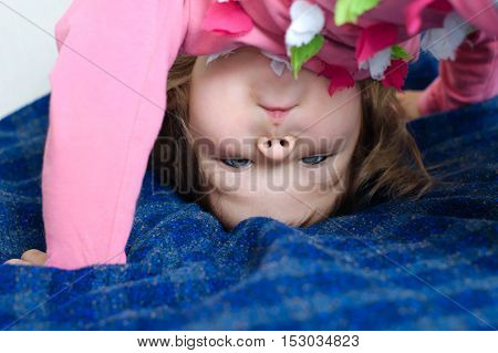 Child With Upside Down Head Looking