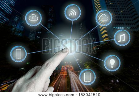 Internet of things futuristic background showing domotic connections with finger