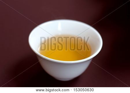 traditional tea in ceramic cup on Chinese style.
