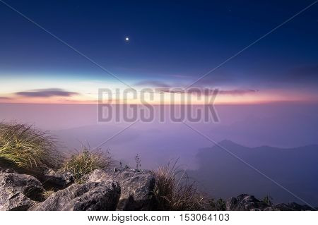 Landscape view on top of mountain with stars.