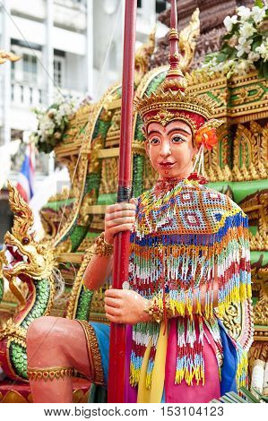 Suratthani, Thailand - October 20, 2016: Ornamented carriers of Buddha images depicting Manohra dancer to be pulled across the city during the famous Chak Phra Festival, an annual Buddhist festival to celebrate the return of Buddha from heaven to earth af