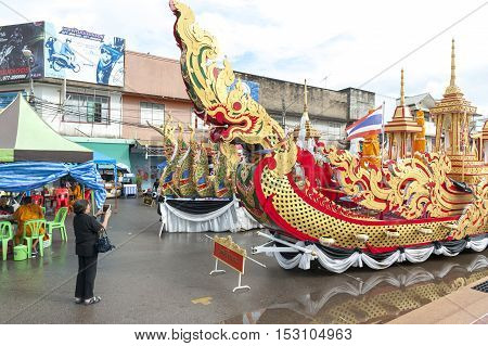 Suratthani, Thailand - October 20, 2016: Ornamented carriers of Buddha images to be pulled across the city during the famous Chak Phra Festival, an annual Buddhist festival to celebrate the return of Buddha from heaven to earth after the end of the three-