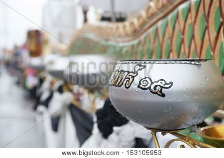 Suratthani, Thailand - October 20, 2016: Details on ornamented carriers of Buddha images to be pulled across the city during the famous Chak Phra Festival, an annual Buddhist festival to celebrate the return of Buddha from heaven to earth after the end of