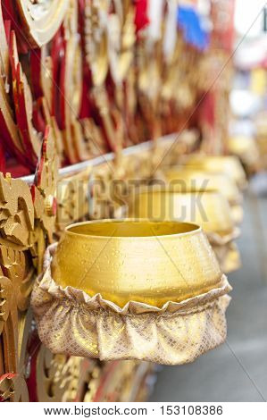 Suratthani, Thailand - October 20, 2016: Details on ornamented carriers of Buddha images to be pulled across the city during the famous Chak Phra Festival, an annual Buddhist festival to celebrate the return of Buddha from heaven to earth after the end of