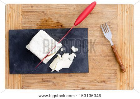 Red Knife Cutting Feta Cheese