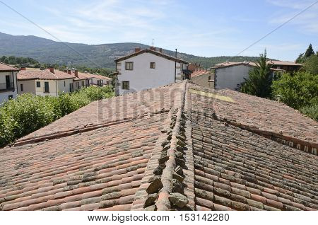 Tile roof and traditional houses in Candelario a typical mountain village in the province of Salamanca Spain.
