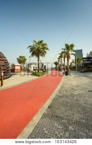 Dubai, UAE - OCTOBER 06, 2016: The Beach Development opposite Jumeirah Beach Residence (JBR) is an array of restaurants, shops and health and fitness venues including gyms and running track