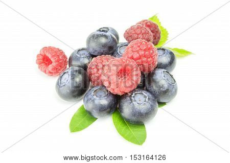Raspberry with blueberry isolated on white background cutout.
