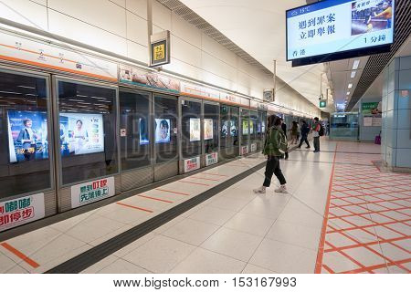 HONG KONG - CIRCA JANUARY, 2016: inside MTR station in Hong Kong. MTR is the rapid transit railway system in Hong Kong. It is one of the most profitable systems in the world