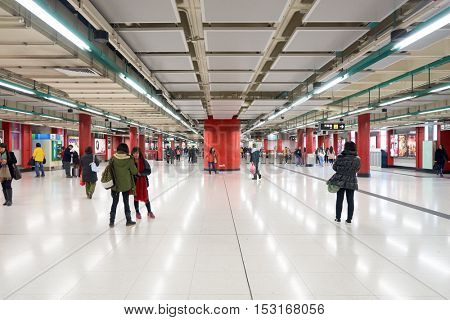 HONG KONG - CIRCA JANUARY, 2016: inside MTR station in Hong Kong. MTR is the rapid transit railway system in Hong Kong. It is one of the most profitable systems in the world