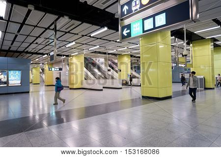 HONG KONG - CIRCA JANUARY, 2016: inside MTR station in Hong Kong. MTR is the rapid transit railway system in Hong Kong. It is one of the most profitable systems in the world