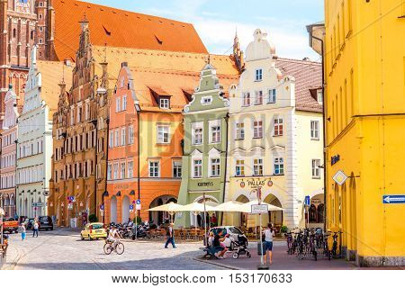 Landshut, Germany - July 04, 2016: Street view with colorful buildings in the center of Landshut old town in Germany. Landshut is a typical bavarian town