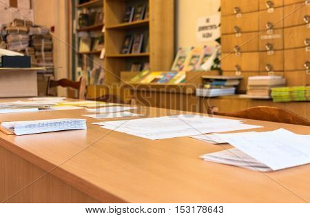 Documents and business papers are on the table